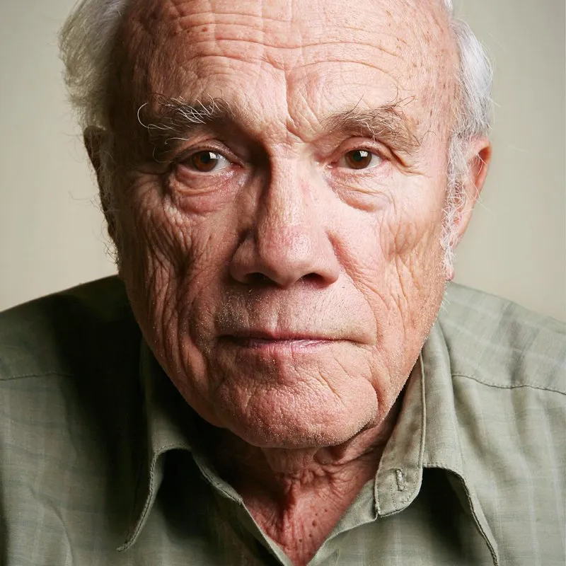 A portrait photograph of an older man